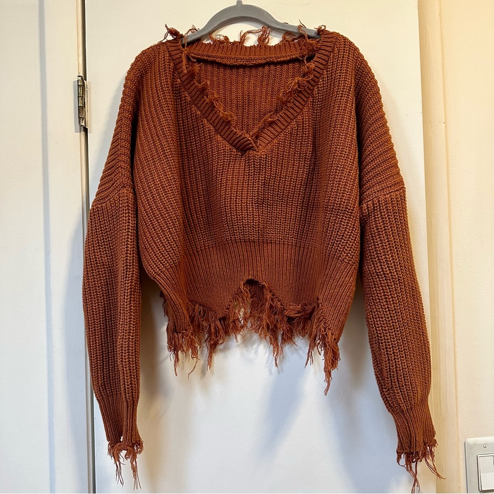 Frayed sweater